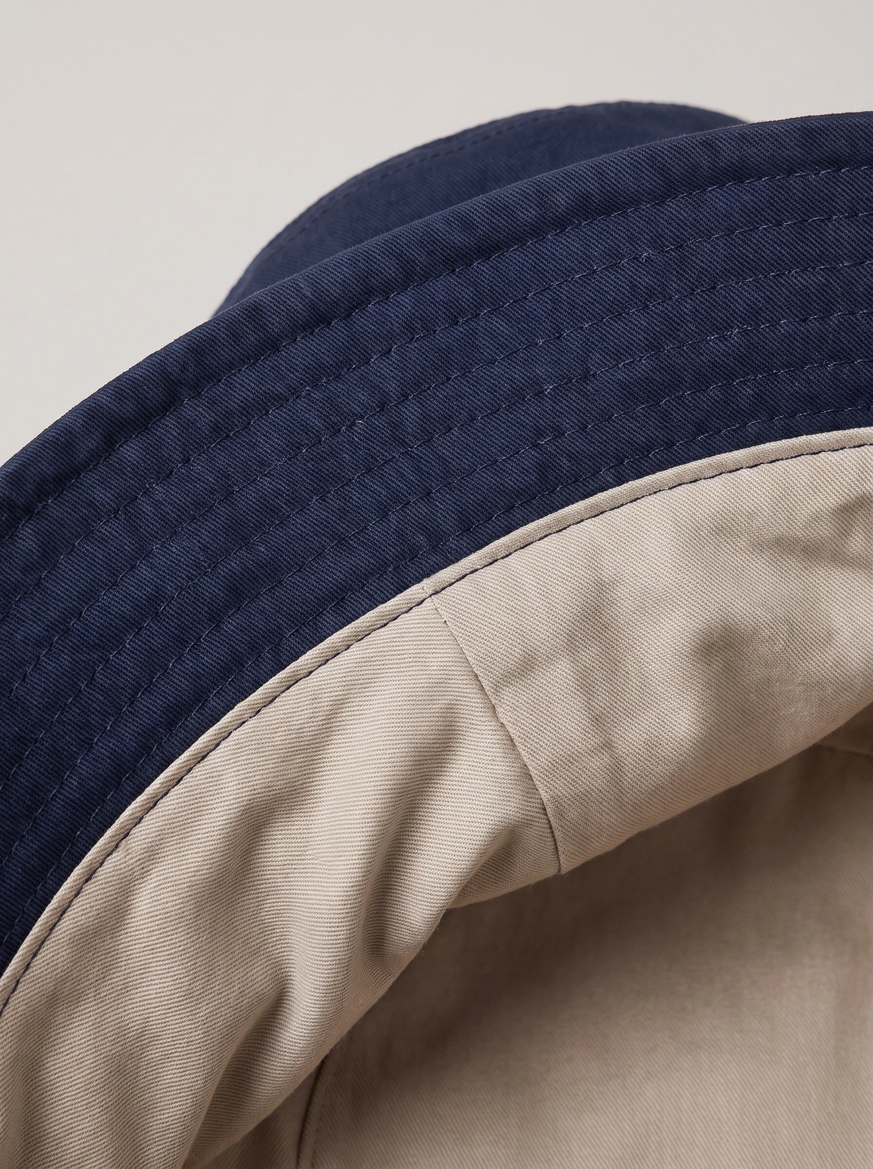Navy Reversible Golf Bucket, unisex caps, Reversible stone lining edge and brim stitching detail