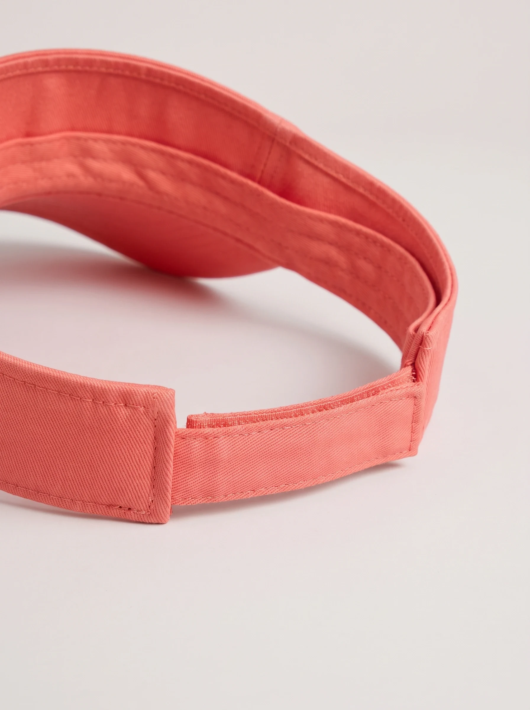 Coral Running Golf Visor, unisex caps, Open crown band and adjustment detail