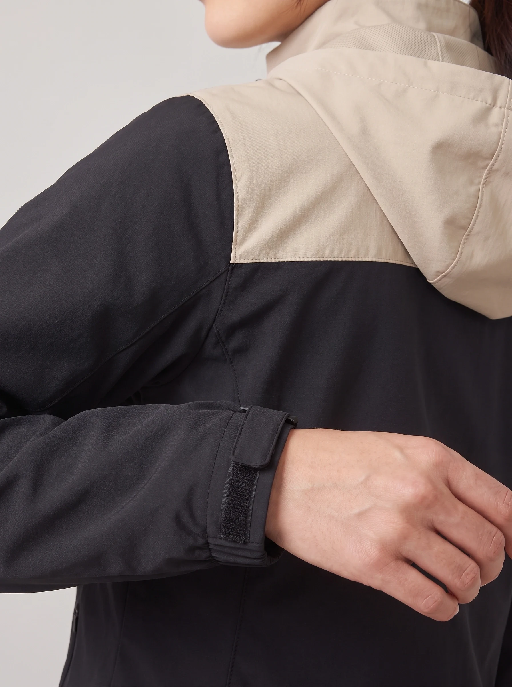 Black Two Tone Hooded Shell, women outerwear, Cuff adjustment tab and two-tone yoke seam detail
