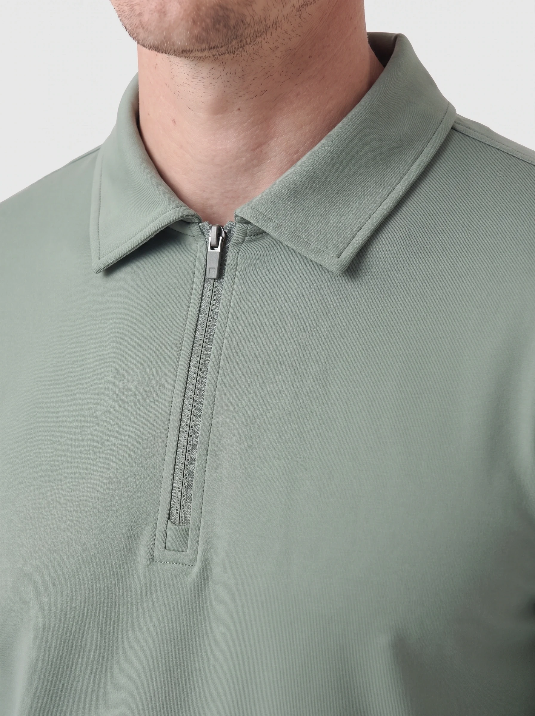 Sage Zip Neck Polo, men solid polos, Neck zipper and self-fabric collar detail