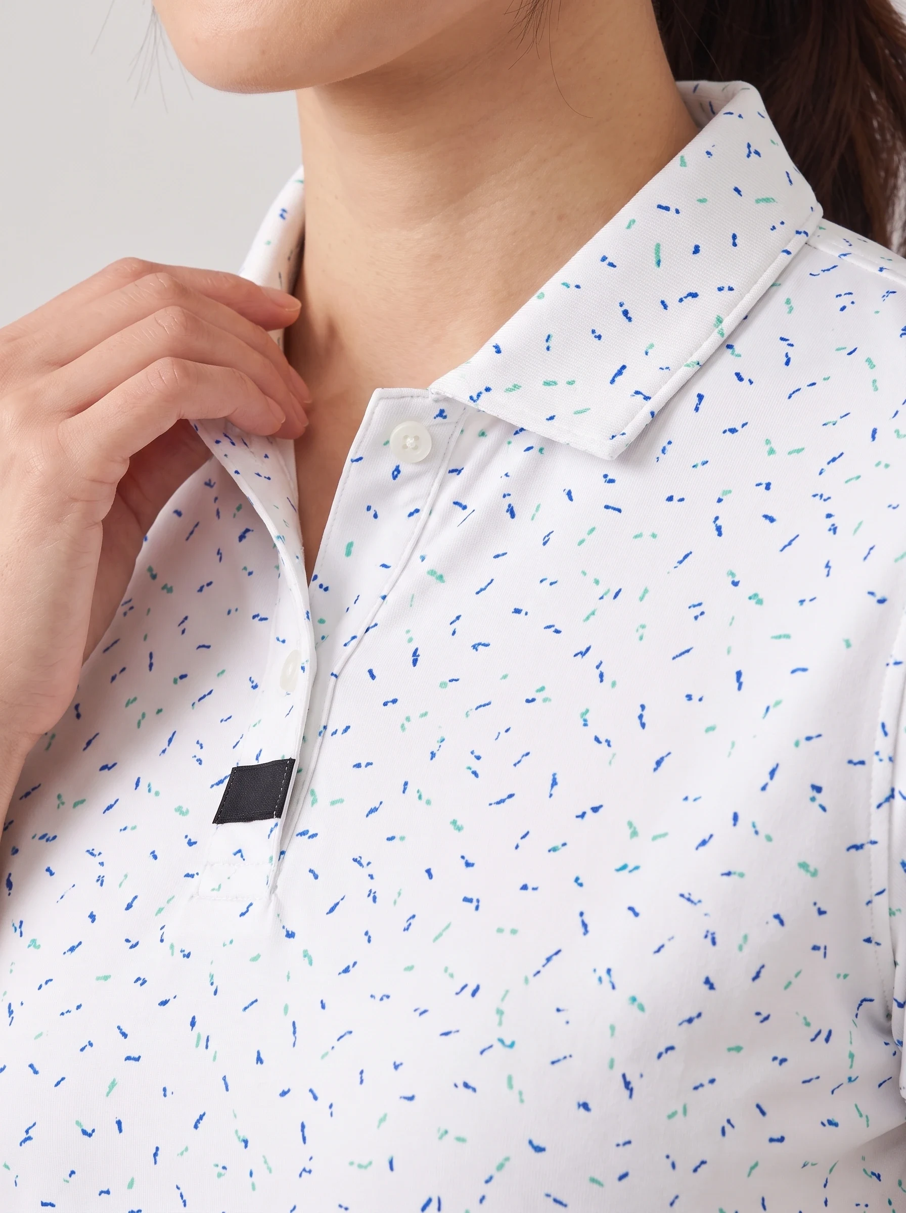 White Abstract Dash Polo, women printed polos, Tiny broken dash print and rib collar detail