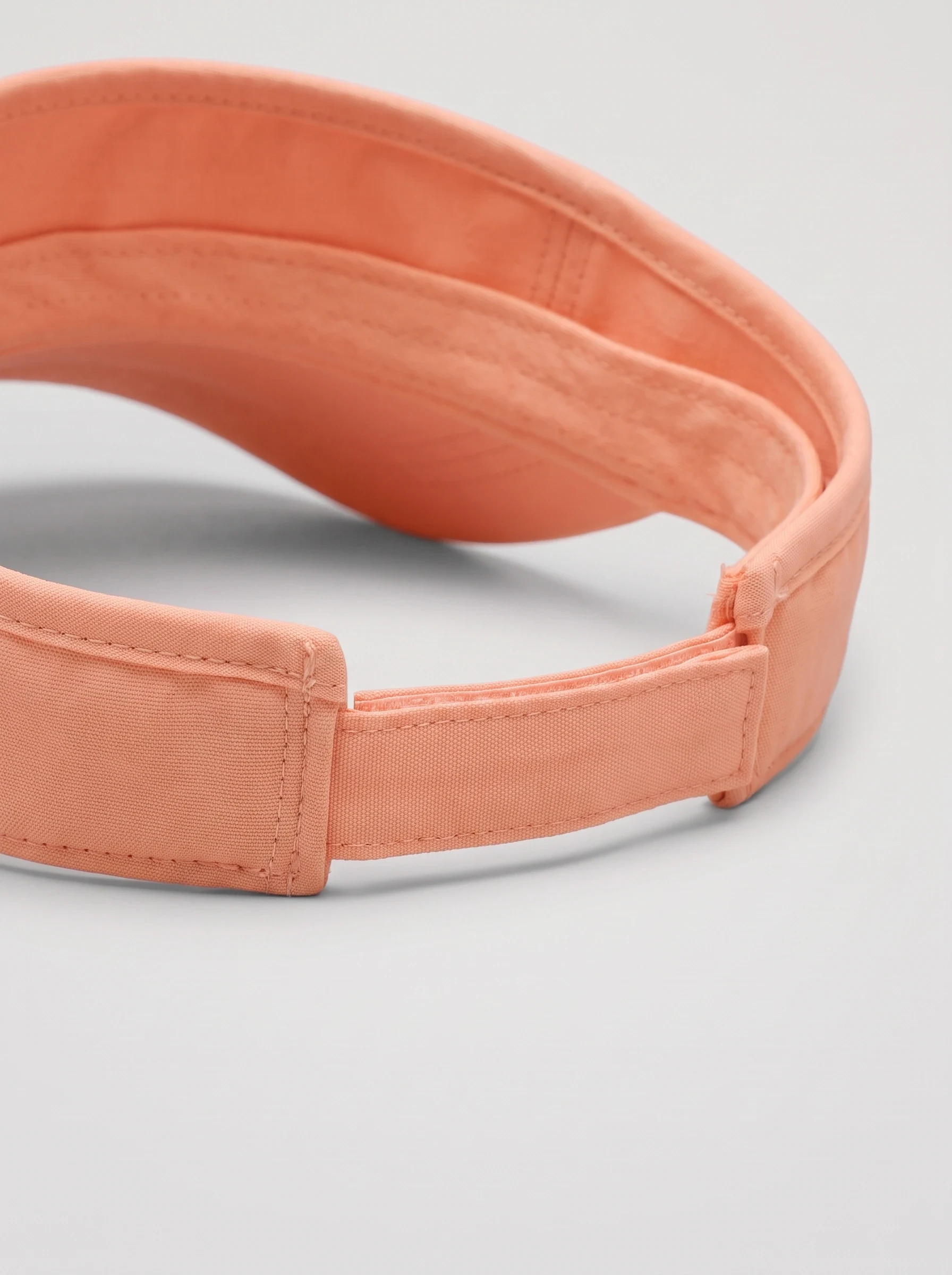 Peach Adjustable Golf Visor, unisex caps, Rear hook-loop strap and open crown detail