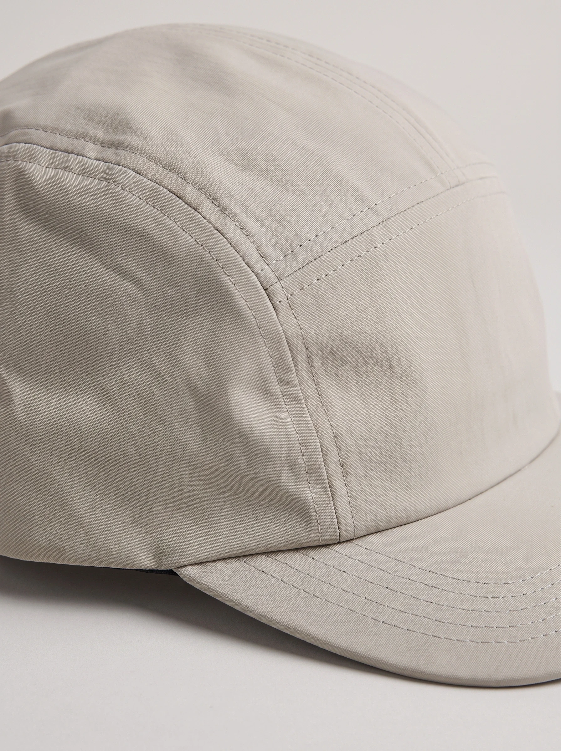 Stone Flat Crown Golf Cap, unisex caps, Flat crown seam and short brim profile detail