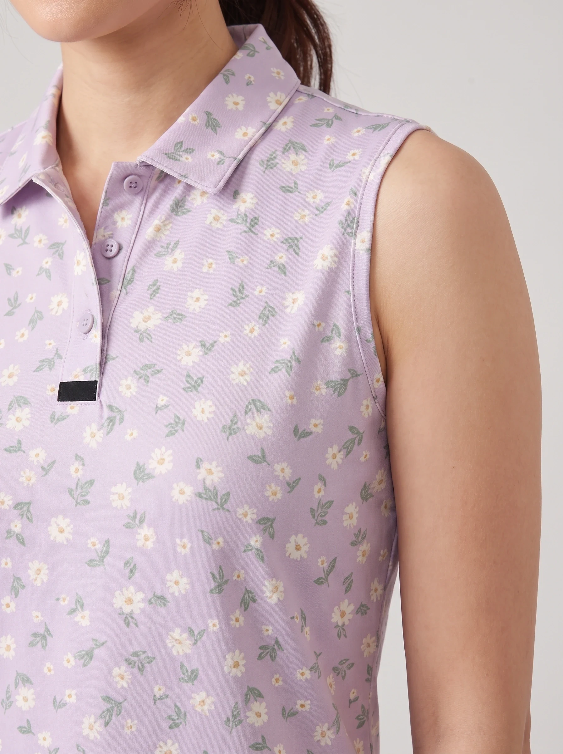 Lilac Meadow Sleeveless Polo, women printed polos, Rounded daisy repeat and armhole detail