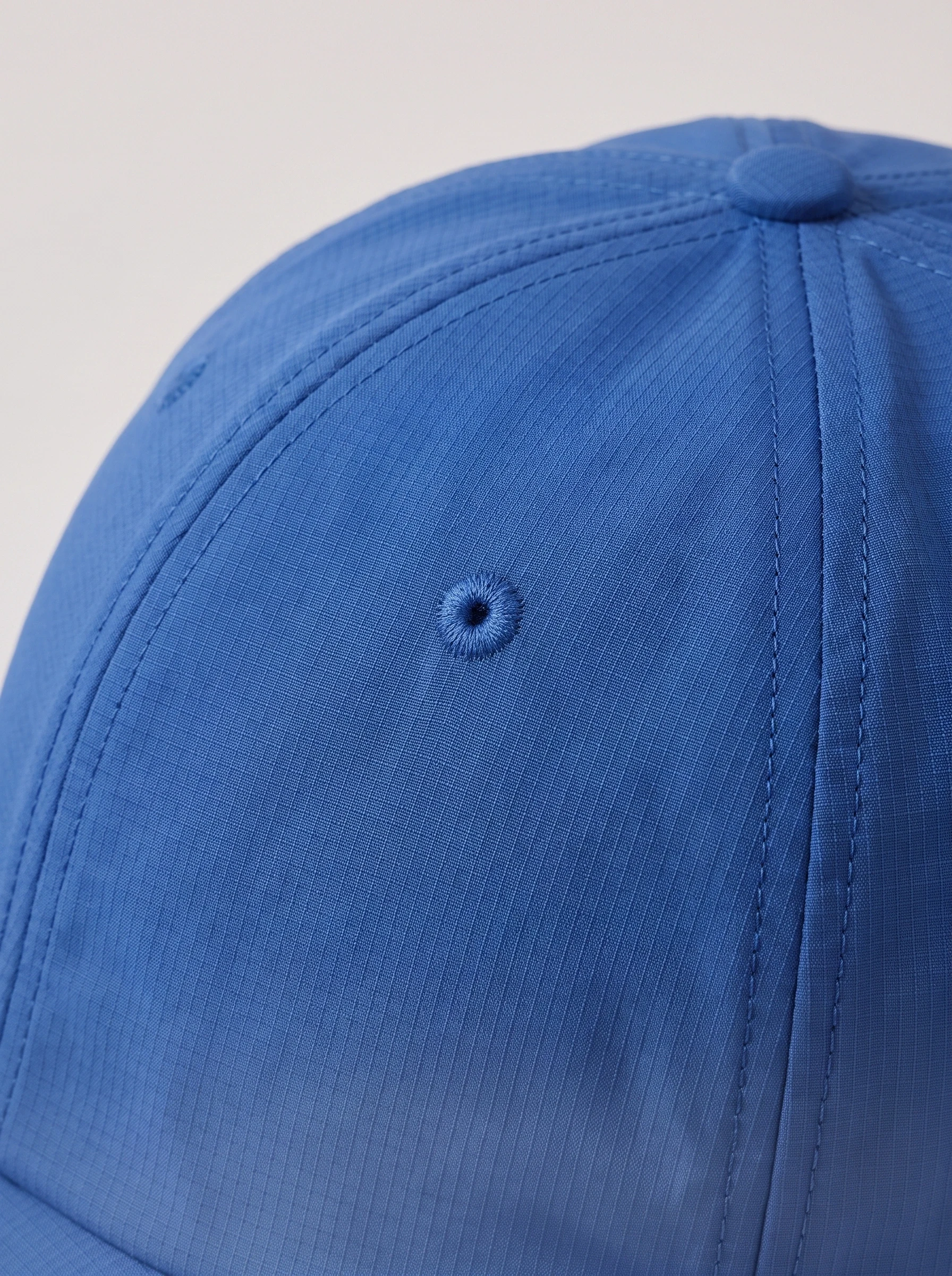 Cobalt Micro Ripstop Golf Cap, unisex caps, Micro-ripstop surface and eyelet detail