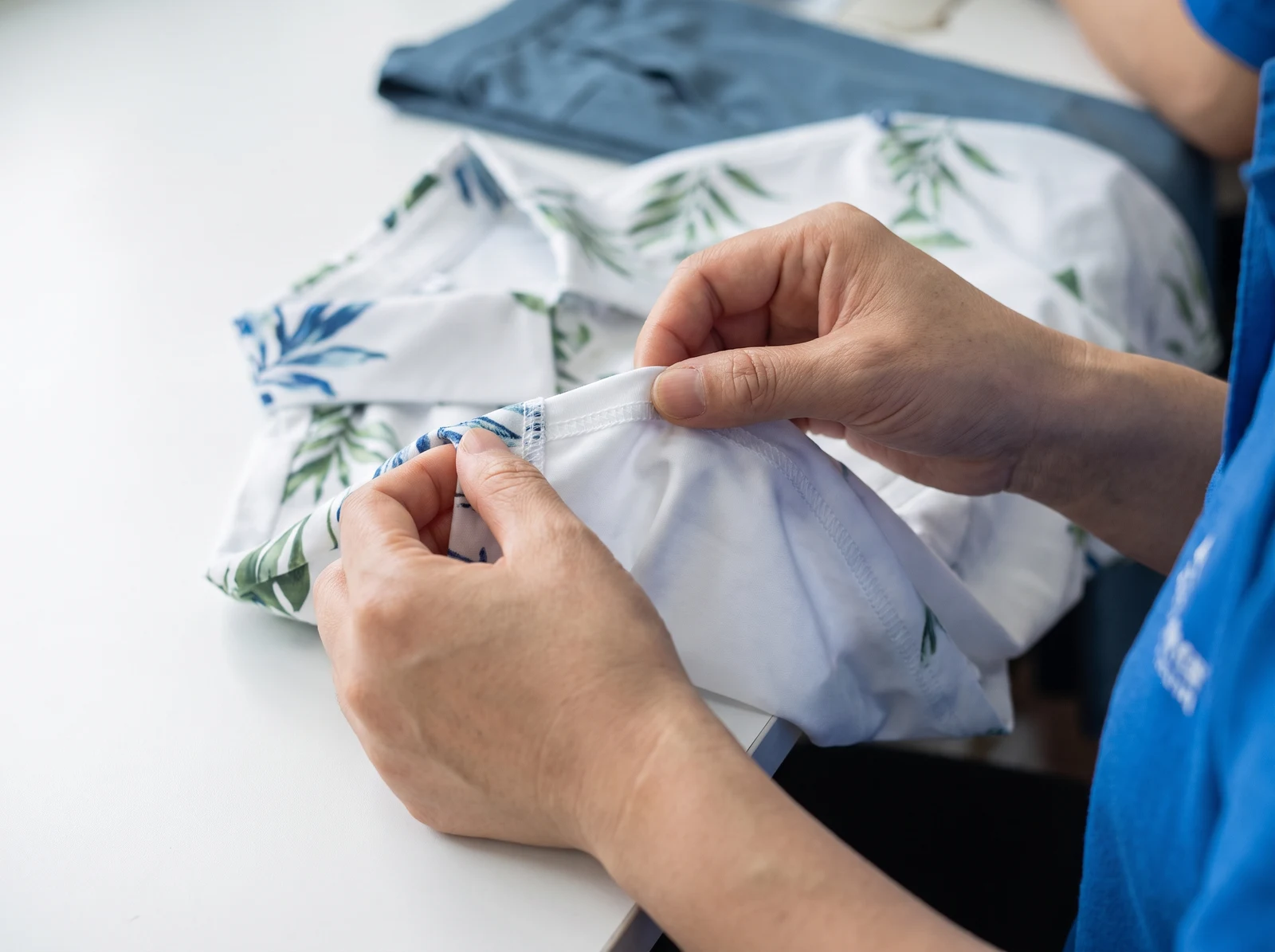 Reviewing a golf polo sample and measurement specification